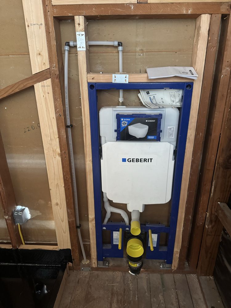 Geberit in-wall toilet carrier system framed and roughed-in during new construction